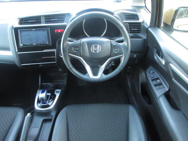 フィットハイブリッド Ｌパッケージ　社外ナビ　ＴＶ　バックカメラ　オートＬＥＤライト　衝突軽減ブレーキ　ハーフレザーシート　コーナーセンサ―　ＥＴＣ　クルーズコントロール　チップアップシート　スイッチ付革巻ステアリング（53枚目）