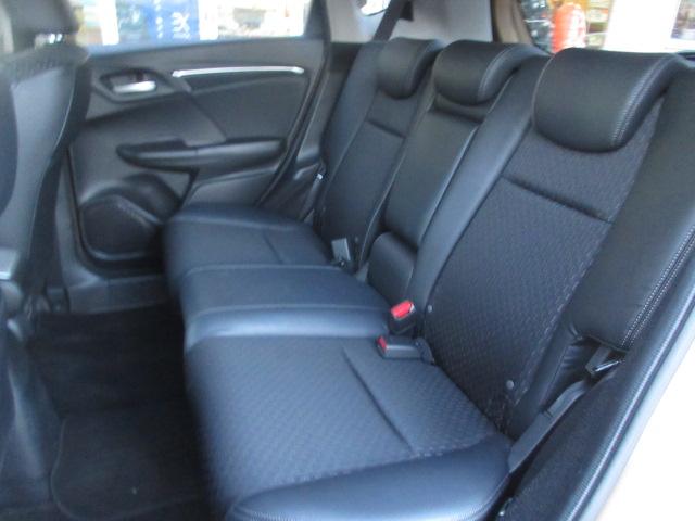 フィットハイブリッド Ｌパッケージ　社外ナビ　ＴＶ　バックカメラ　オートＬＥＤライト　衝突軽減ブレーキ　ハーフレザーシート　コーナーセンサ―　ＥＴＣ　クルーズコントロール　チップアップシート　スイッチ付革巻ステアリング（59枚目）