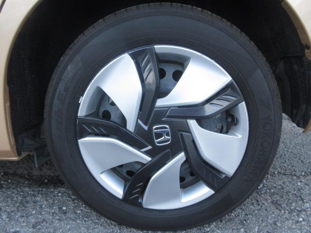 フィットハイブリッド Ｌパッケージ　社外ナビ　ＴＶ　バックカメラ　オートＬＥＤライト　衝突軽減ブレーキ　ハーフレザーシート　コーナーセンサ―　ＥＴＣ　クルーズコントロール　チップアップシート　スイッチ付革巻ステアリング（63枚目）