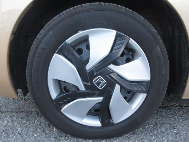 フィットハイブリッド Ｌパッケージ　社外ナビ　ＴＶ　バックカメラ　オートＬＥＤライト　衝突軽減ブレーキ　ハーフレザーシート　コーナーセンサ―　ＥＴＣ　クルーズコントロール　チップアップシート　スイッチ付革巻ステアリング（64枚目）