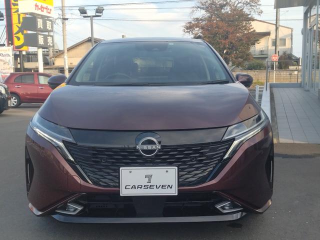 オーラ Ｇ　純正ナビ　全方位カメラ　衝突被害軽減ブレーキ　障害物センサー　プロパイロット　ＢＯＳＥスピーカー　シートヒーター　ステアリングヒーター　ドラレコ　ＬＥＤヘッドランプ　ＥＴＣ　禁煙車　ワンオーナー（2枚目）