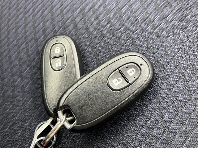 ワゴンＲ ＦＸリミテッド　タイヤ４本新品　車検Ｒ９年３月　プッシュスタート　オートエアコン　リアスポイラー　革巻きハンドル　ウインカーミラー　純正１４インチアルミ　マット・バイザー付き（12枚目）