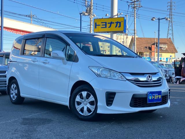 フリード G プレミアムエディション 雹凹みあり 6人乗り 純正9インチナビ フルセグTV バックカメラ フリップダウンリアモニター ETC ドラレコ 両側電動スライドドア HID キーフリー クルーズコントロール 車検R9年4月(4枚目)