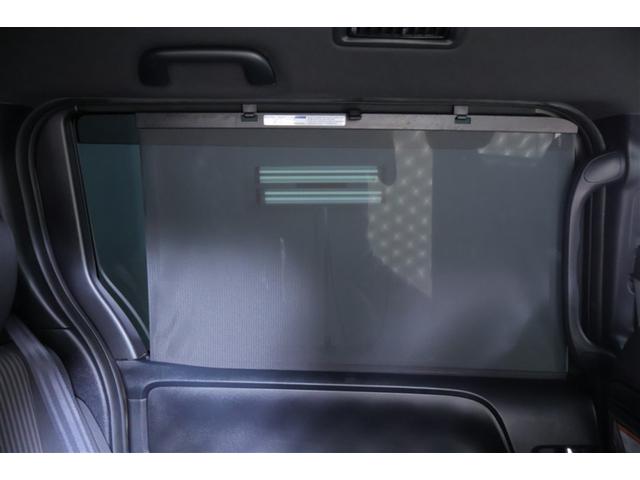 ヴォクシー ハイブリッドZS 煌II 電動両側スライドドア パワーステアリング DVD再生可 リアクーラー スマキー 地デジTV AUX 横滑防止 1オーナー 点検記録簿 Wエアバック AAC LEDランプ エアバッグ ナビTV クルコン(36枚目)