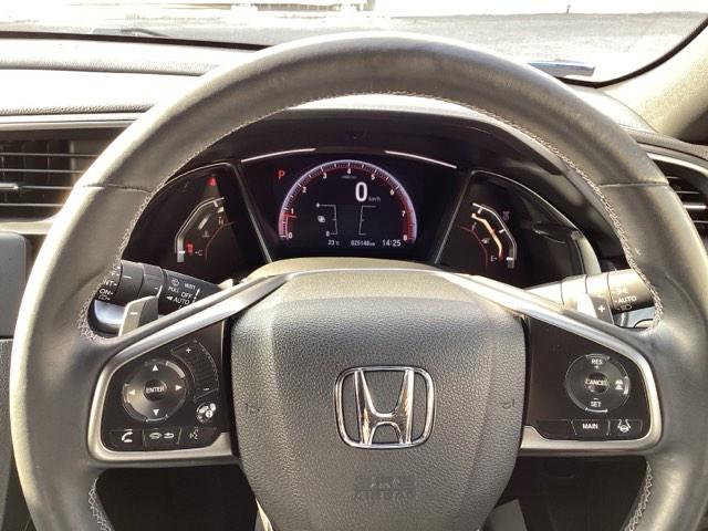 シビック ハッチバックホンダセンシング　オートクルーズ　地デジチューナー　Ａストップ　シートヒータ　リアカメラ　ＥＴＣ車載器　横滑り防止　カーテンエアバッグ　ＬＥＤライト　記録簿　ＤＶＤ　オートエアコン　ＰＳ（21枚目）