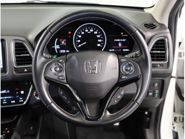 ヴェゼル ハイブリッドZ・ホンダセンシング レーダーサポート DVD再生機能 横滑り防止システム バックアイカメラ 盗難防止装置 フルセ シートヒーター付 スマ-トキ- ECOモード パワーウィンド ナビ&TV(15枚目)