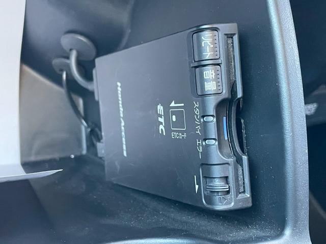 フリード Ｇ　エアロ　Ｌパッケージ　禁煙／７人乗り／メーカーナビ／フルセグＴＶ／バックカメラ／ＥＴＣ／キーレス／自動スライドドア／ＨＩＤ／盗難防止／マット／バイザー／黒革調シートカバー／純正１５キンチアルミ／エアロ／Ｒスポイラー（25枚目）