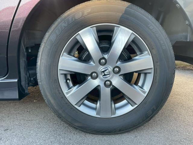 フリード Ｇ　エアロ　Ｌパッケージ　禁煙／７人乗り／メーカーナビ／フルセグＴＶ／バックカメラ／ＥＴＣ／キーレス／自動スライドドア／ＨＩＤ／盗難防止／マット／バイザー／黒革調シートカバー／純正１５キンチアルミ／エアロ／Ｒスポイラー（30枚目）