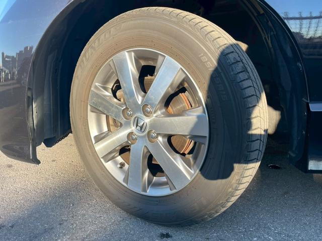 フリード Ｇ　エアロ　Ｌパッケージ　禁煙／７人乗り／メーカーナビ／フルセグＴＶ／バックカメラ／ＥＴＣ／キーレス／自動スライドドア／ＨＩＤ／盗難防止／マット／バイザー／黒革調シートカバー／純正１５キンチアルミ／エアロ／Ｒスポイラー（31枚目）