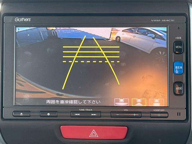 Ｎ－ＢＯＸ Ｇ・Ｌパッケージ　禁煙／あんしんパッケージ／自動スライドドア／純正ナビ／１セグＴＶ／バックカメラ／オートエアコン／プッシュスタート／レベライザー／スペアキー／記録簿／マット／バイザー／盗難防止／２０２４年製タイヤ（21枚目）