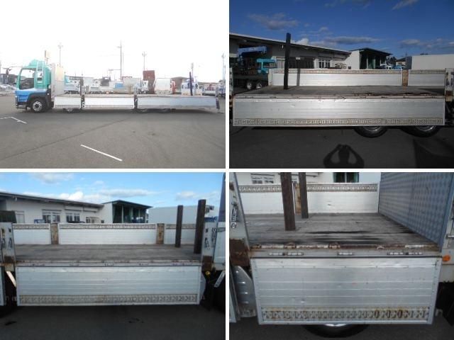 ギガ 　アルミブロック平ボディ　４軸低床　積載１３．９ｔ　荷台寸法９５２ｘ２４０ｘ５９　荷台床板張り　総輪エアサス　内フック９対　中央１１個　引出しフック１８対　スタンションホール４カ所／３本（23枚目）