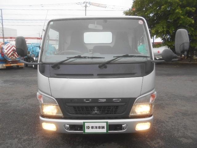 キャンター 　コンクリートミキサー車　上物極東開発製　ドラム容量２．５立米　ドラム混合１．２立米　積載２．９５ｔ　電動ホッパーカバー　水タンク＆モーター付　１５０馬力　走行１５万ｋｍ　５速ミッション（6枚目）