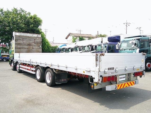 ギガ 　アルミブロック平ボディ　上物昭和車体製　荷台寸９６０ｘ２３６ｘ４８　荷台床木張り　横ネタ鉄製　積載１４．１ｔ　４軸低床　２デフ　リターダー付　後輪エアサス　アオリ５方開　ＥＴＣ通電確認済み（7枚目）