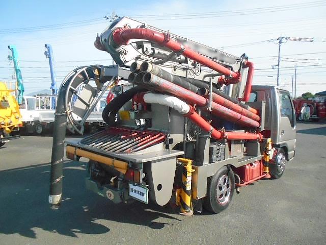 エルフトラック 　コンクリートポンプ車　上物極東開発製　上物型式ＰＨ３５－１１　真空スクイーズ式　３段屈折式ブーム　地上高１１．４ｍ　３６０°全旋回　ラジコン２個あり（無線）　走行６万ｋｍ（6枚目）