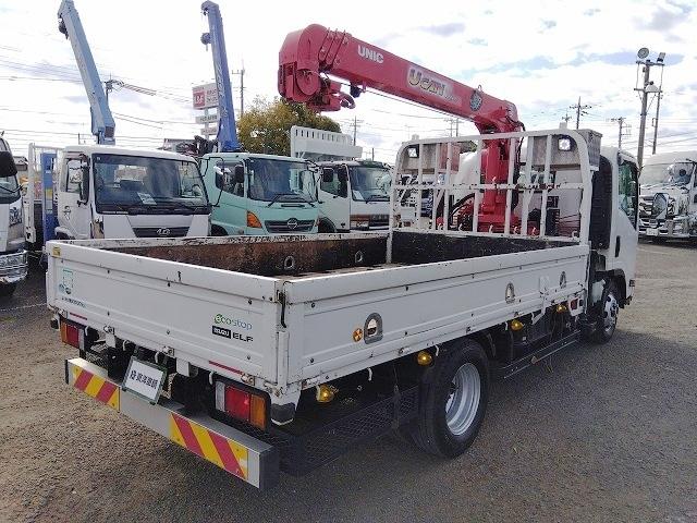 エルフトラック クレーン付平ボディ 上物古河ユニック製 4段ブーム ラジコン付(無線) フックイン 2.9t吊り 差し違いアウトリガー 積載3t ワイドボディ 荷台寸法356x208x35 荷台床木張り 内フック付(6枚目)