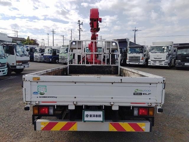 エルフトラック クレーン付平ボディ 上物古河ユニック製 4段ブーム ラジコン付(無線) フックイン 2.9t吊り 差し違いアウトリガー 積載3t ワイドボディ 荷台寸法356x208x35 荷台床木張り 内フック付(9枚目)