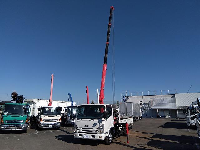 エルフトラック クレーン付平ボディ 上物古河ユニック製 4段ブーム ラジコン付(無線) フックイン 2.9t吊り 差し違いアウトリガー 積載3t ワイドボディ 荷台寸法356x208x35 荷台床木張り 内フック付(38枚目)