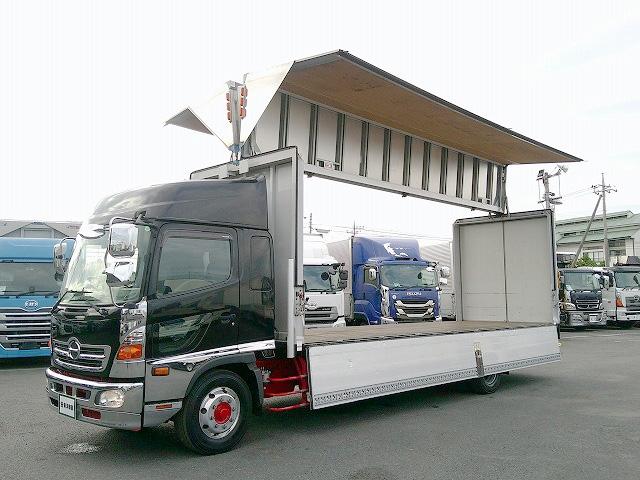ヒノレンジャー 　アルミウイング　上物トランテックス製　積載７ｔ　荷台寸７２７×２２３×２３１　７．２ｍセミワイドボディ　増トン車　ラッシングレール１段　内フック８対　ハイルーフ　リーフサス　横ネタ鉄製　社外ナビ有（7枚目）