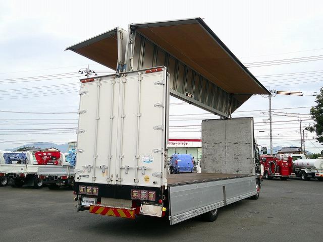 ヒノレンジャー 　アルミウイング　上物トランテックス製　積載７ｔ　荷台寸７２７×２２３×２３１　７．２ｍセミワイドボディ　増トン車　ラッシングレール１段　内フック８対　ハイルーフ　リーフサス　横ネタ鉄製　社外ナビ有（12枚目）