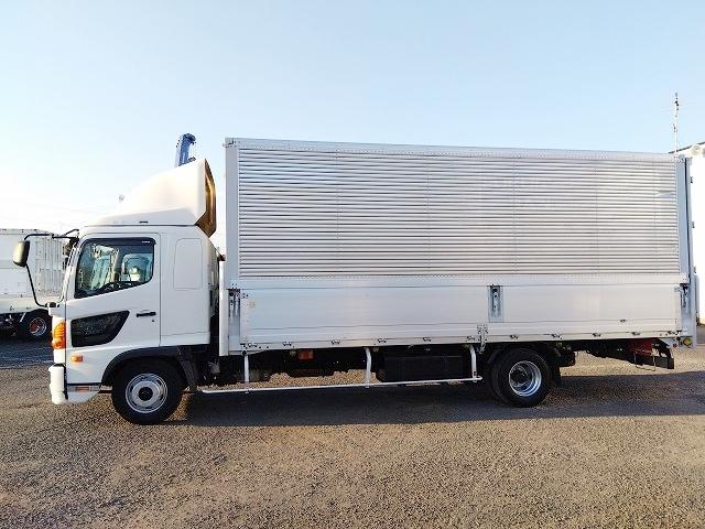 ヒノレンジャー 　アルミウイング　上物トランテックス製　６．２ｍワイドボディ　積載３．０５ｔ　荷台寸法６２６ｘ２４０ｘ２４０　荷台床木張り　あおり開閉サポート付　ラッシングレール２段　内フック付　ベッド付（5枚目）