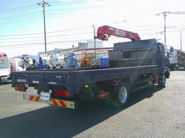 ファイター 　クレーン付平ボディ　上物古河ユニック製　４段ブーム　２．９ｔ吊　フックイン　角足、差違いアウトリガー　リアジャッキ付　積載７．１ｔ　荷台寸５０９ｘ２３８ｘ１７　ワイドボディ　荷台床木張り　内フック９対（5枚目）