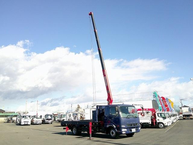 ファイター 　クレーン付平ボディ　上物古河ユニック製　４段ブーム　２．９ｔ吊　フックイン　角足、差違いアウトリガー　リアジャッキ付　積載７．１ｔ　荷台寸５０９ｘ２３８ｘ１７　ワイドボディ　荷台床木張り　内フック９対（6枚目）