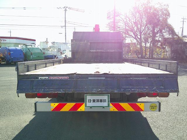 ファイター 　クレーン付平ボディ　上物古河ユニック製　４段ブーム　２．９ｔ吊　フックイン　角足、差違いアウトリガー　リアジャッキ付　積載７．１ｔ　荷台寸５０９ｘ２３８ｘ１７　ワイドボディ　荷台床木張り　内フック９対（34枚目）