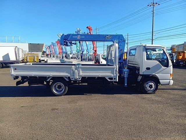 エルフトラック 　クレーン付平ボディ　上物タダノ製　４段ブーム　ラジコン付（無線）　フックイン　２．６ｔ吊り　積載３ｔ　ワイドロングボディ　アオリ５方開　荷台寸４１１ｘ２０８ｘ３７（8枚目）