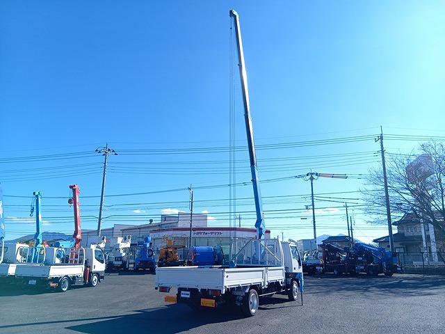 エルフトラック 　クレーン付平ボディ　上物タダノ製　４段ブーム　ラジコン付（無線）　フックイン　２．６ｔ吊り　積載３ｔ　ワイドロングボディ　アオリ５方開　荷台寸４１１ｘ２０８ｘ３７（27枚目）