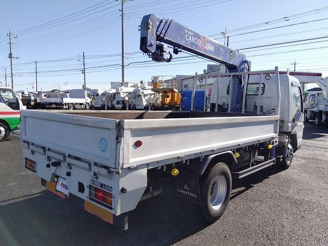 キャンター 　クレーン付平ボディ　上物タダノ製　４段ブーム　ラジコン付（無線）　フックイン　２．９ｔ吊り　差し違いアウトリガー　ワイドロングボディ　積載３．８ｔ　荷台寸法３７４×１９８×３４　荷台床木張り　内フック（7枚目）