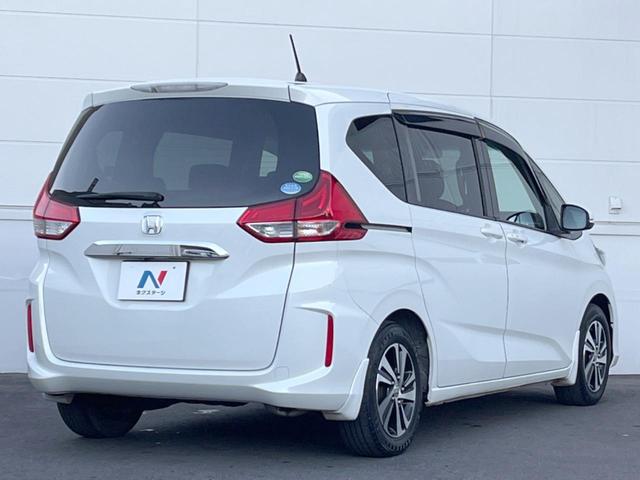 フリード Ｇ・ホンダセンシング　両側電動ドア　純正ＳＤナビ　バックカメラ　衝突被害軽減システム　レーダークルーズ　スマートキー　ＬＥＤヘッド　ビルトインＥＴＣ　車線逸脱警報　オートライト　オートエアコン（18枚目）