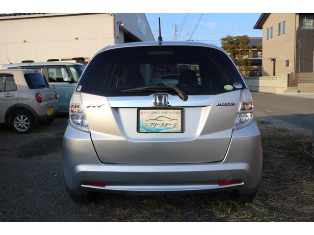 フィットハイブリッド ベースグレード 運転席助手席エアバック Cコントロール キーレスエントリーキー パワーウィンドウ イモビライザー AUTOエアコン ABS PS 運転席エアバック(10枚目)