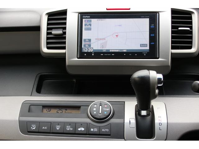 フリードハイブリッド ジャストセレクション 両側パワースライドドア スマートキー 社外アルミホイール ハーフレザーシート HIDヘッドライト フォグランプ クルーズコントロール ETC 横滑り防止装置 電動格納ミラー 純正ナビ バックカメラ(33枚目)