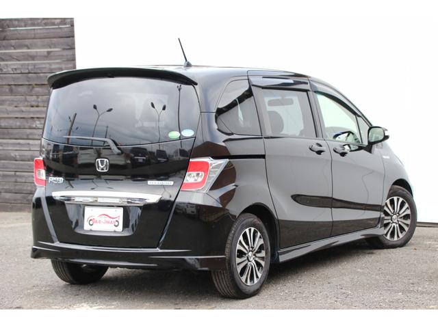 フリードハイブリッド ジャストセレクション　ギャザーズインターナビフルセグＢｌｕｅｔｏｏｔｈ対応　両側パワースライドドア　バックカメラ　ＨＩＤヘッドライト　ハーフレザーシート　スマートキー　ＥＴＣ　ウインカーミラー　純正アルミ　横滑り防止装置（6枚目）