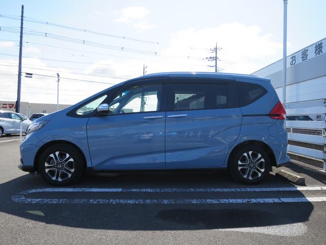 フリード＋ハイブリッド ハイブリッド・クロスターホンダセンシング　ナビ装着用スペシャルパッケージ＋ＥＴＣ車載器（ナビ連動）リア両側パワースライドドアＬＥＤヘッドライト＋アクティブコーナリングライトセンターテーブルオートリトラミラー　禁煙　バックカメラ　地デジフルセグ（7枚目）