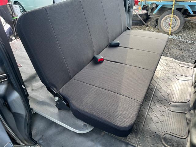 サンバーバン トランスポーター ワンオーナー 禁煙車 新品タイヤ 4AT タイミングチェーン 両側スライドドア 純正ラジオ キーレス パワステ パワーウィンドウ プライバシーガラス オーバーヘッドコンソール 運転席&助手席エアバック(29枚目)