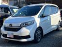 フリードハイブリッド ハイブリッド・Gホンダセンシング ワンオーナー Sパッケージ メンテナンスパック実施車両 専用アルミホイール ハーフレザーシート 本革ステアリング 両側パワースライドドア Bluetooth ナビ TV スマートキー 取説 記録簿 中古車画像_4