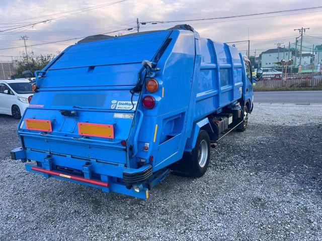 デュトロ パッカー車 プレス式 7.2M3 新明和 MT 後輪ダブル バックカメラ パワーウィンドウ ディーゼル 積載量3050 総重量7955 全長637幅209高234 3人乗り 4000cc(6枚目)