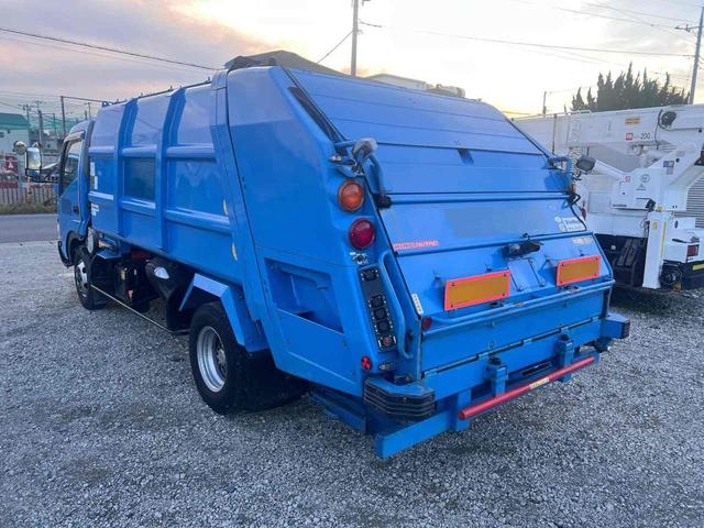 デュトロ パッカー車 プレス式 7.2M3 新明和 MT 後輪ダブル バックカメラ パワーウィンドウ ディーゼル 積載量3050 総重量7955 全長637幅209高234 3人乗り 4000cc(7枚目)