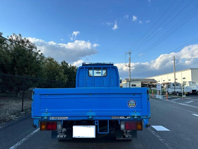 エルフトラック 　いすゞ　平成１５年式　１．５ｔ平ボディ　車検付令和７年１０月１４日　走行距離５．７万ｋｍ　ＭＴ５速　ＥＴＣ付　パワステ　パワーウィンドウ　ＡＢＳ　エアコン（11枚目）