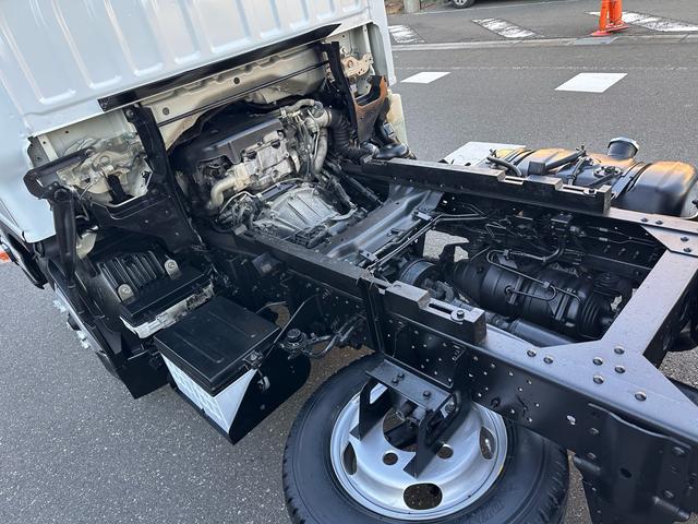 エルフトラック 　いすゞ　平成２４年式　２ｔ低床ダンプ　ＥＴＣ付き　ＭＴ５速　パワステ　パワーウィンドウ　ＡＢＳ　エアコン（65枚目）