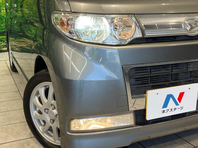 タント カスタムＲＳ　電動スライドドア　禁煙車　ターボ　純正オーディオ　ＨＩＤヘッドライト　キーフリーシステム　ＭＯＭＯ製革巻きステアリング　純正１５インチアルミホイール　ＣＤ再生　盗難防止装置　プライバシーガラス（11枚目）