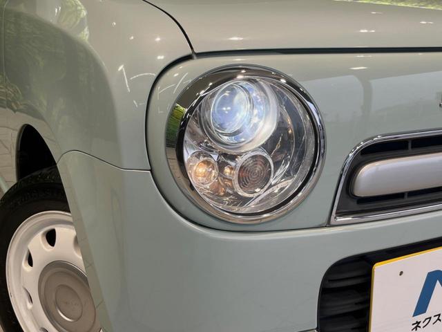 アルトラパンショコラ Ｘ　ＳＤナビ　禁煙車　スマートキー　ＨＩＤヘッド　オートライト　オートエアコン　純正１４インチ　ＣＤ　地デジ（12枚目）