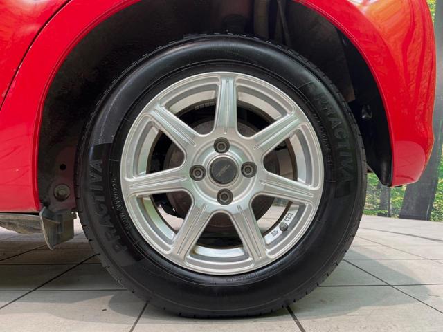 ヴィッツ Ｆ　ＣＤ再生　リモコンキー　プライバシーガラス　ドアバイザー　電動格納ミラー　衝突安全ボディ　盗難防止装置　１４インチアルミホイール（47枚目）