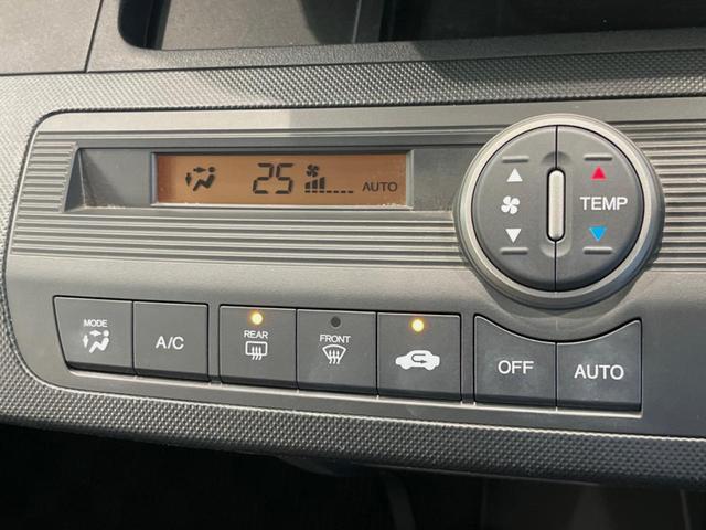 フリード G ジャストセレクション 両側電動ドア 純正HDDナビ バックカメラ 禁煙車 スマートキー HIDヘッド ETC オートライト オートエアコン CD/DVD再生 14インチアルミホイール 電動格納ミラー ドアバイザー(6枚目)