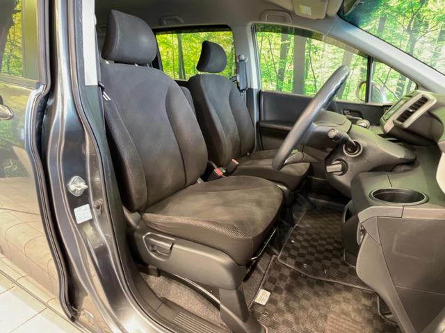 フリード G ジャストセレクション 両側電動ドア 純正HDDナビ バックカメラ 禁煙車 スマートキー HIDヘッド ETC オートライト オートエアコン CD/DVD再生 14インチアルミホイール 電動格納ミラー ドアバイザー(8枚目)