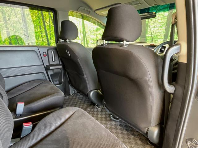 フリード G ジャストセレクション 両側電動ドア 純正HDDナビ バックカメラ 禁煙車 スマートキー HIDヘッド ETC オートライト オートエアコン CD/DVD再生 14インチアルミホイール 電動格納ミラー ドアバイザー(32枚目)