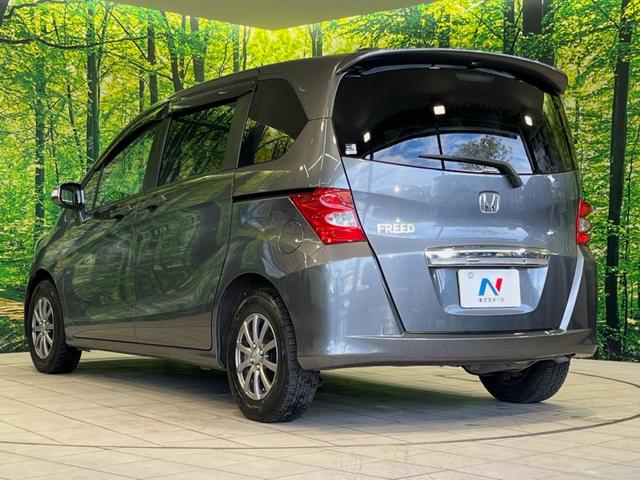 フリード G ジャストセレクション 両側電動ドア 純正HDDナビ バックカメラ 禁煙車 スマートキー HIDヘッド ETC オートライト オートエアコン CD/DVD再生 14インチアルミホイール 電動格納ミラー ドアバイザー(39枚目)