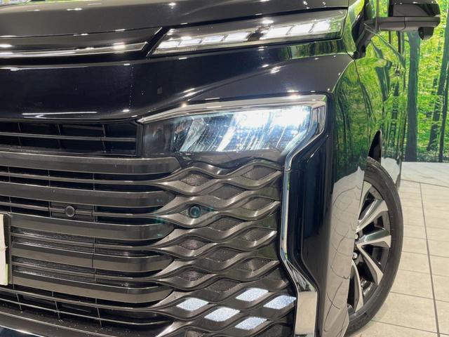 ヴォクシー Ｓ－Ｚ　メーカー１０．５型ナビ　禁煙車　両側電動スライドドア　パワーバックドア　シートヒーター　ステアリングヒーター　バックカメラ　純正１７インチアルミホイール　リアオートエアコン　衝突被害軽減システム（13枚目）