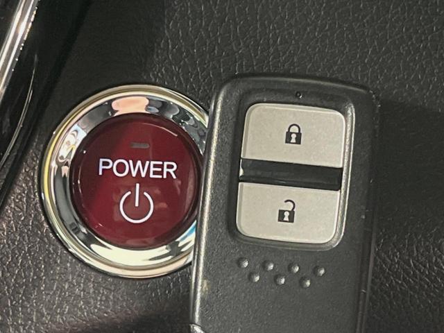 ヴェゼル ハイブリッドX 純正ナビ バックカメラ 衝突被害軽減システム 禁煙車 スマートキー LEDヘッド ルーフレール ビルトインETC クルコン 純正17インチアルミ オートライト オートエアコン Bluetooth CD(7枚目)